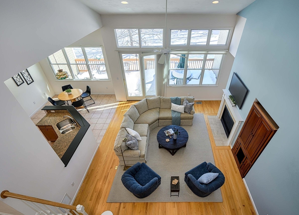 173 Nobscot Road, Unit 173 Sudbury, MA 01776 - Photo 20 of 37 a living room with furniture and a window