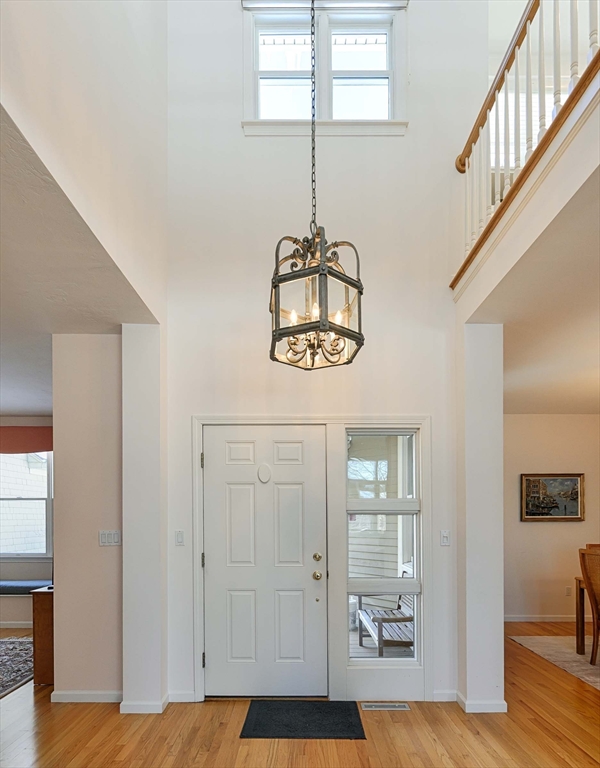 173 Nobscot Road, Unit 173 Sudbury, MA 01776 - Photo 2 of 37 a bedroom with a bed and a window