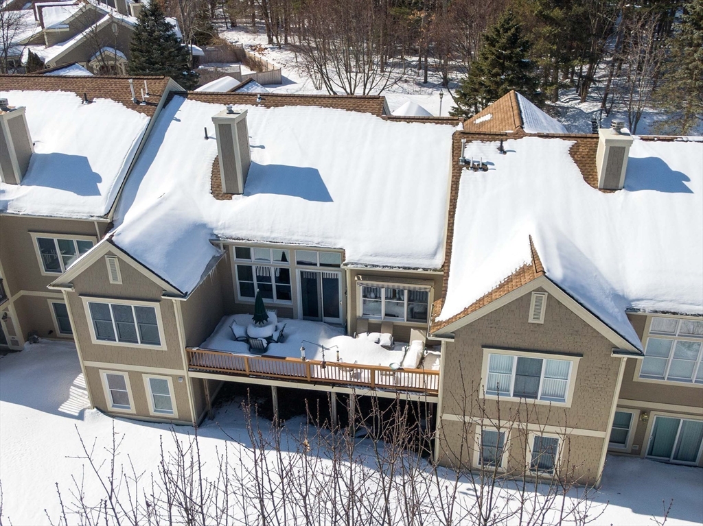 173 Nobscot Road, Unit 173 Sudbury, MA 01776 - Photo 29 of 37 a view of a house with wooden deck