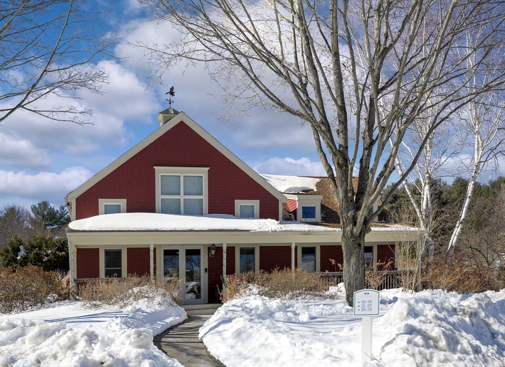 173 Nobscot Road, Unit 173 Sudbury, MA 01776 - Photo 31 of 37 a front view of a house with yard porch and seating space