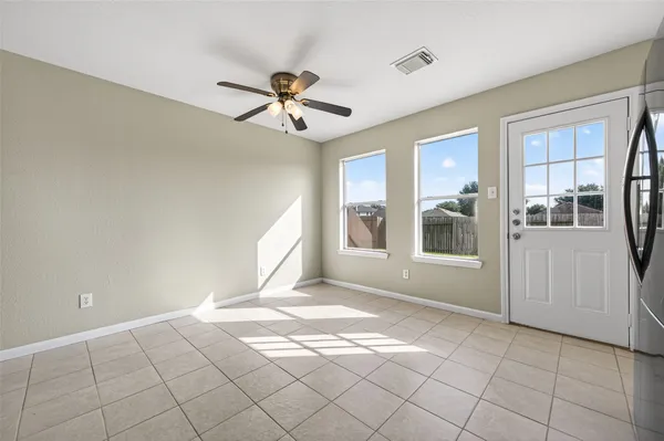 a view of cabinets and window