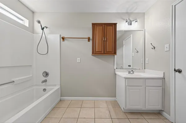 a bathroom with a bathtub