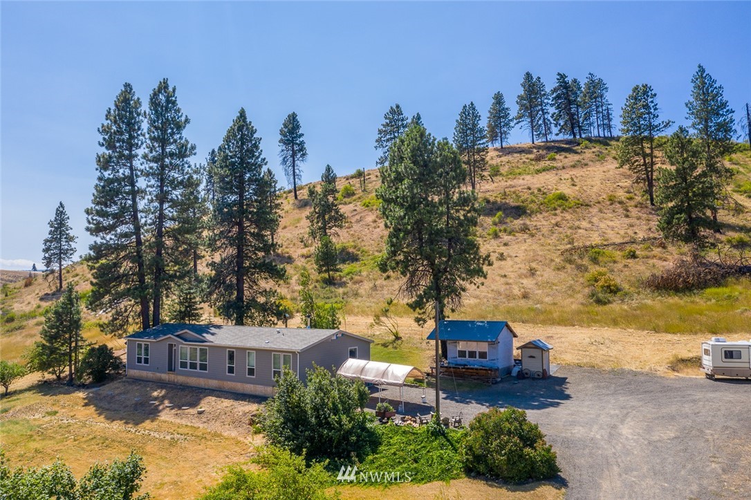 a view of a city with tall buildings in the background