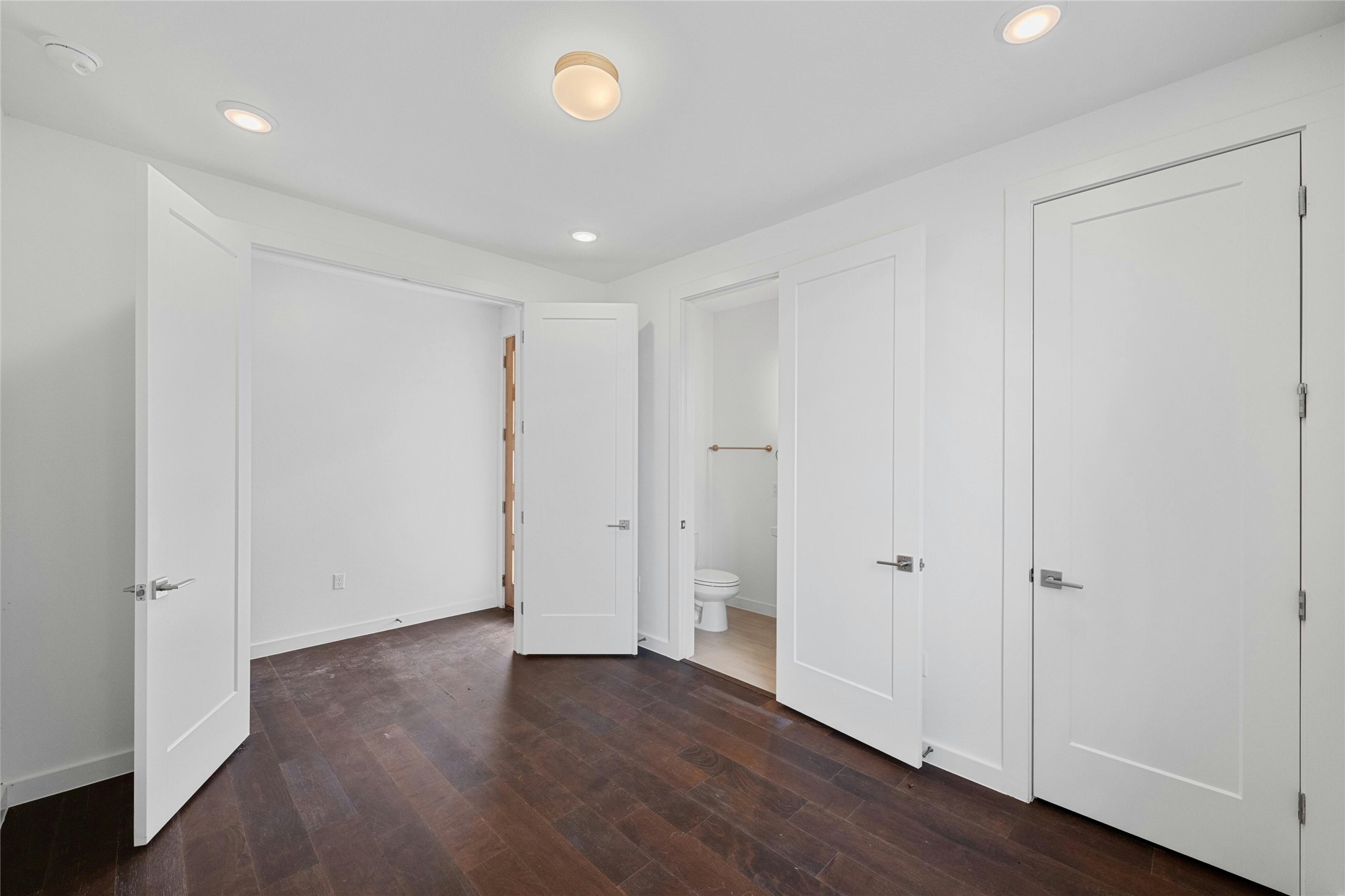 6825 Wolfcreek Pass, Unit 2 Austin, TX 78749 - Photo 22 of 34 wooden floor in an empty room
