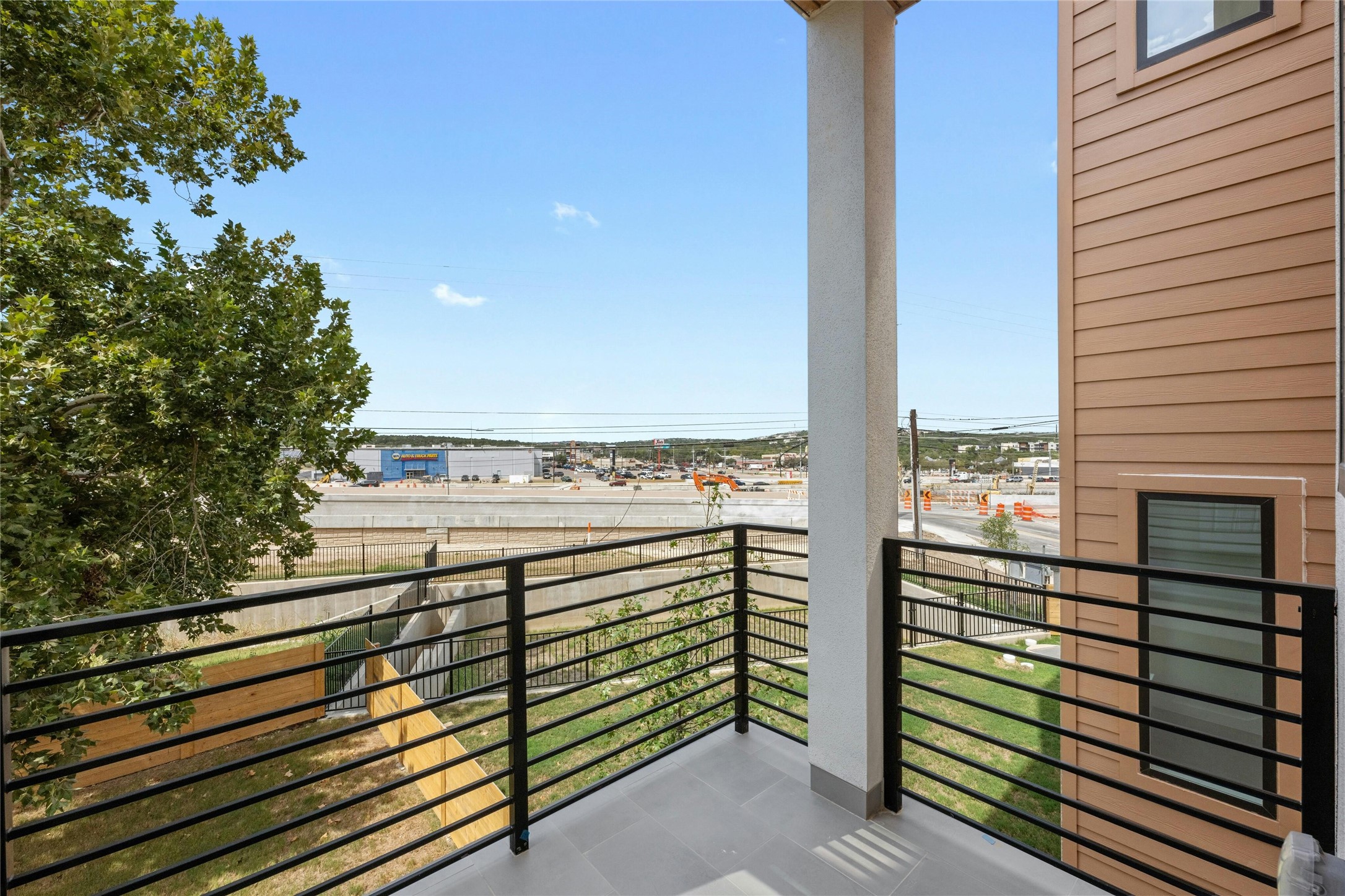 6825 Wolfcreek Pass, Unit 2 Austin, TX 78749 - Photo 29 of 34 a view of a balcony with an outdoor space