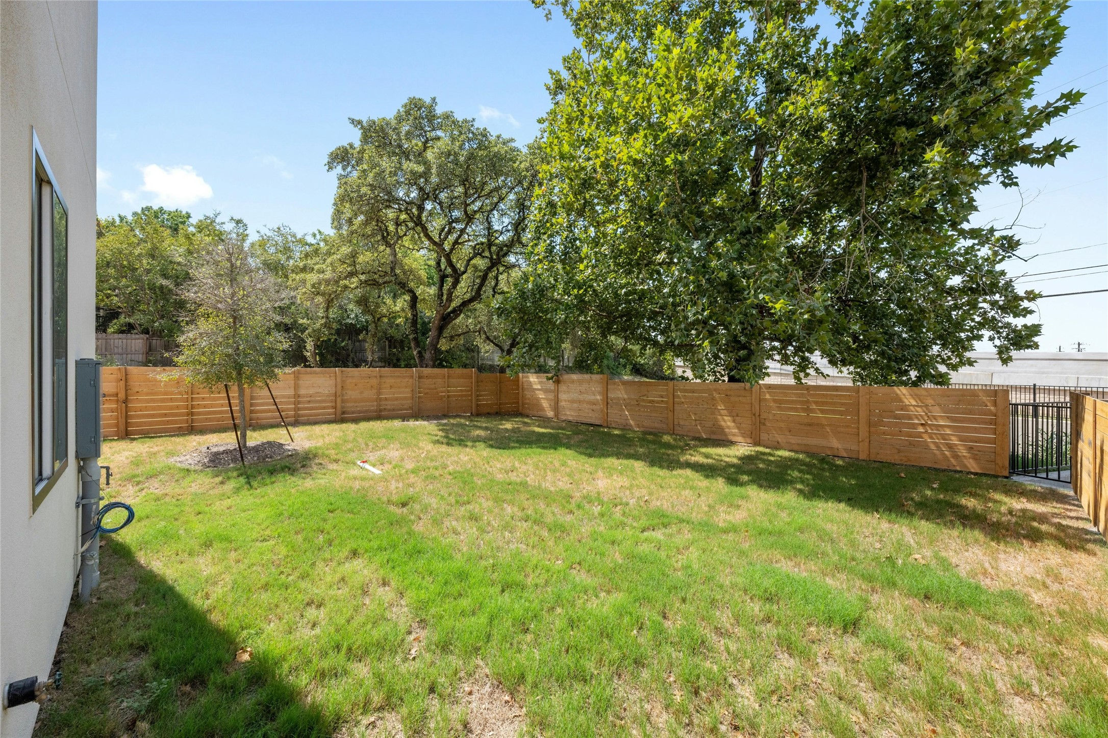 6825 Wolfcreek Pass, Unit 2 Austin, TX 78749 - Photo 30 of 34 a view of a backyard