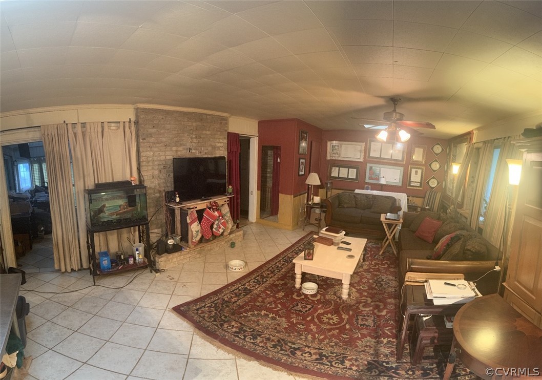 1832 Manakin Road Manakin-Sabot, VA 23103 - Photo 13 of 23 a living room with furniture and a flat screen tv