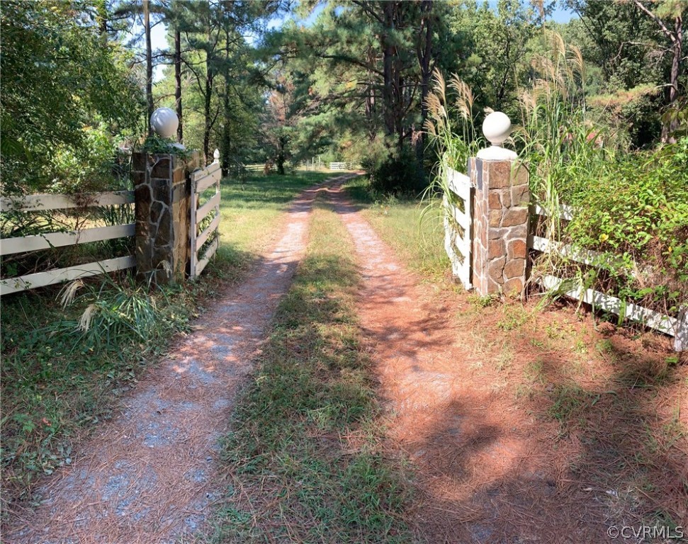1832 Manakin Road Manakin-Sabot, VA 23103 - Photo 6 of 23 a backyard of a house with lots of green space