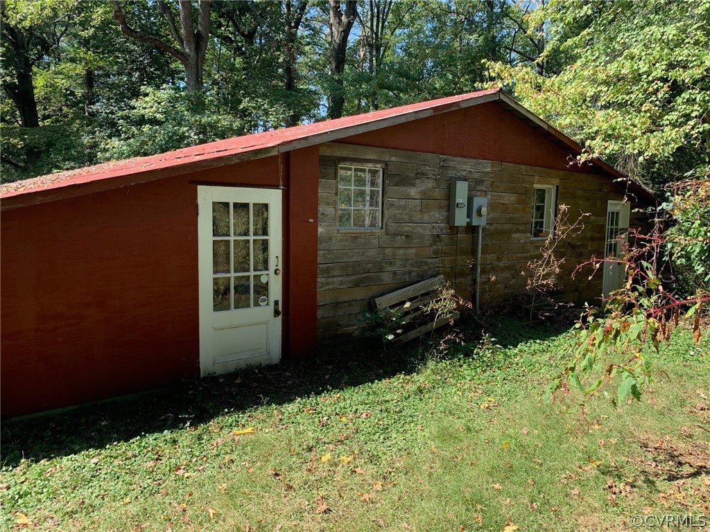 1832 Manakin Road Manakin-Sabot, VA 23103 - Photo 8 of 23 a view of a small house with a yard