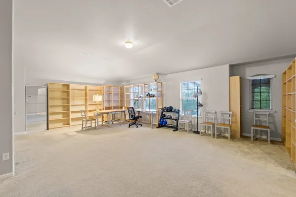 a view of a room with racks on the wall