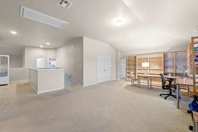 a big room with furniture and a large window