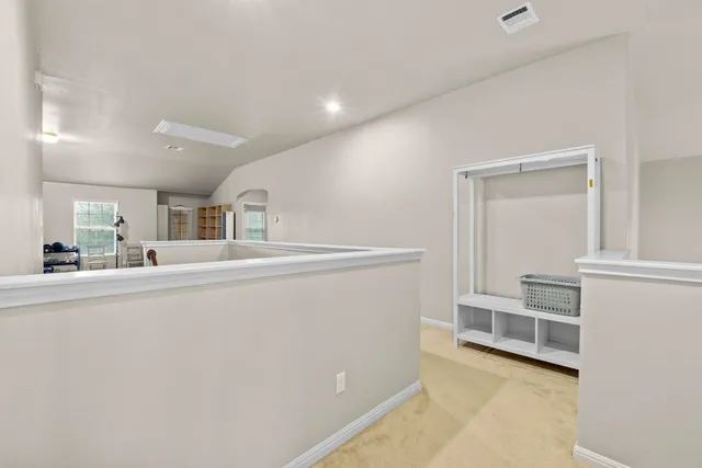 a view of an empty walk in closet