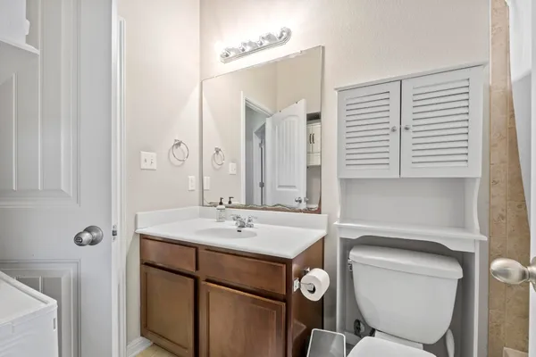 a bedroom with a bed and a closet