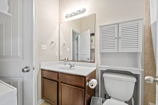 a bedroom with a bed and a closet