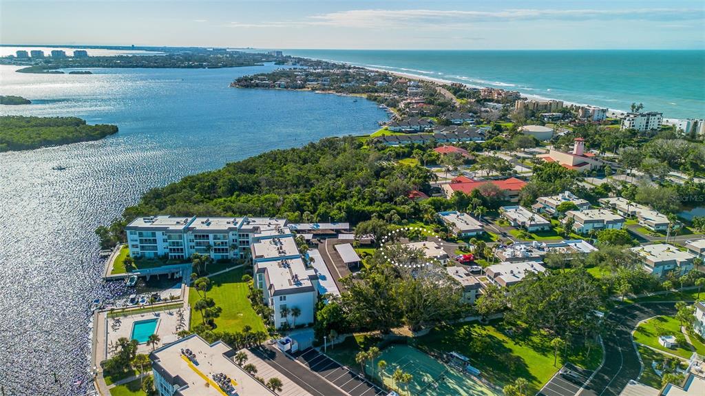 597 Sutton Place Longboat Key, FL 34228 - Photo 40 of 49 a view of a city and ocean view