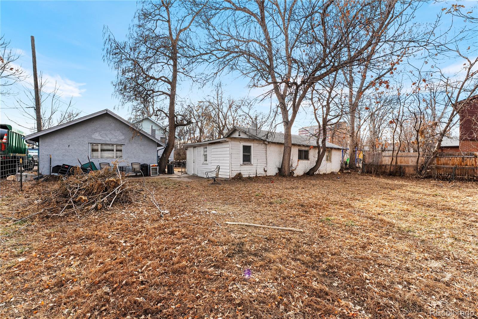 6145 West 38th Avenue Wheat Ridge, CO 80033 - Photo 26 of 39 a view of house with a yard