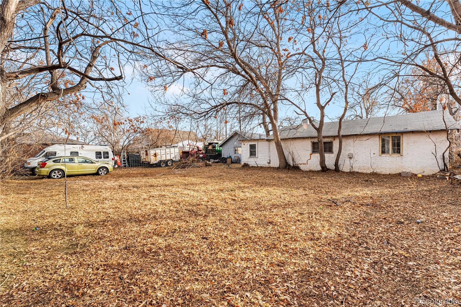6145 West 38th Avenue Wheat Ridge, CO 80033 - Photo 27 of 39 a view of yard with car parked