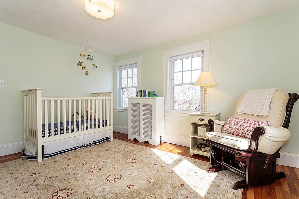 40 Kilsythe Road Arlington, MA 02476 - Photo 12 of 16 a living room with furniture and a window