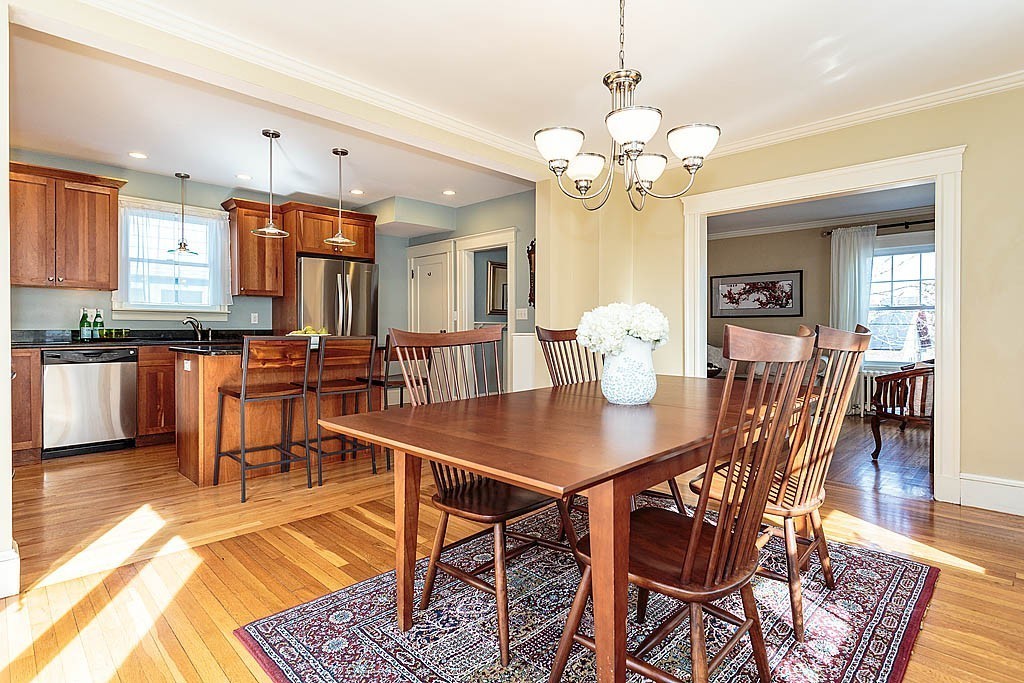 40 Kilsythe Road Arlington, MA 02476 - Photo 2 of 16 a view of a dining room with furniture and wooden floor