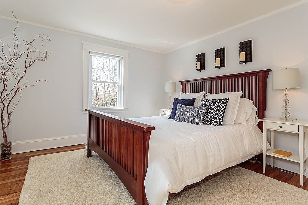 40 Kilsythe Road Arlington, MA 02476 - Photo 9 of 16 a bedroom with a bed and a window