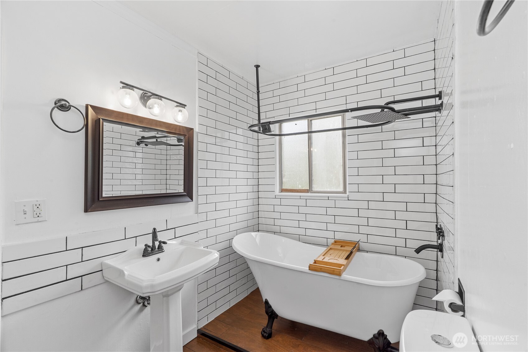 2405 1st Street Cosmopolis, WA 98537 - Photo 11 of 36 a bathroom with a sink a toilet and shower