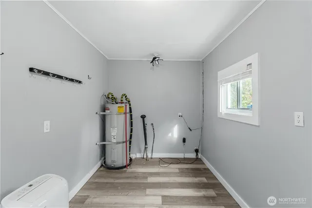 a spacious bathroom with a sink mirror and a bath tub