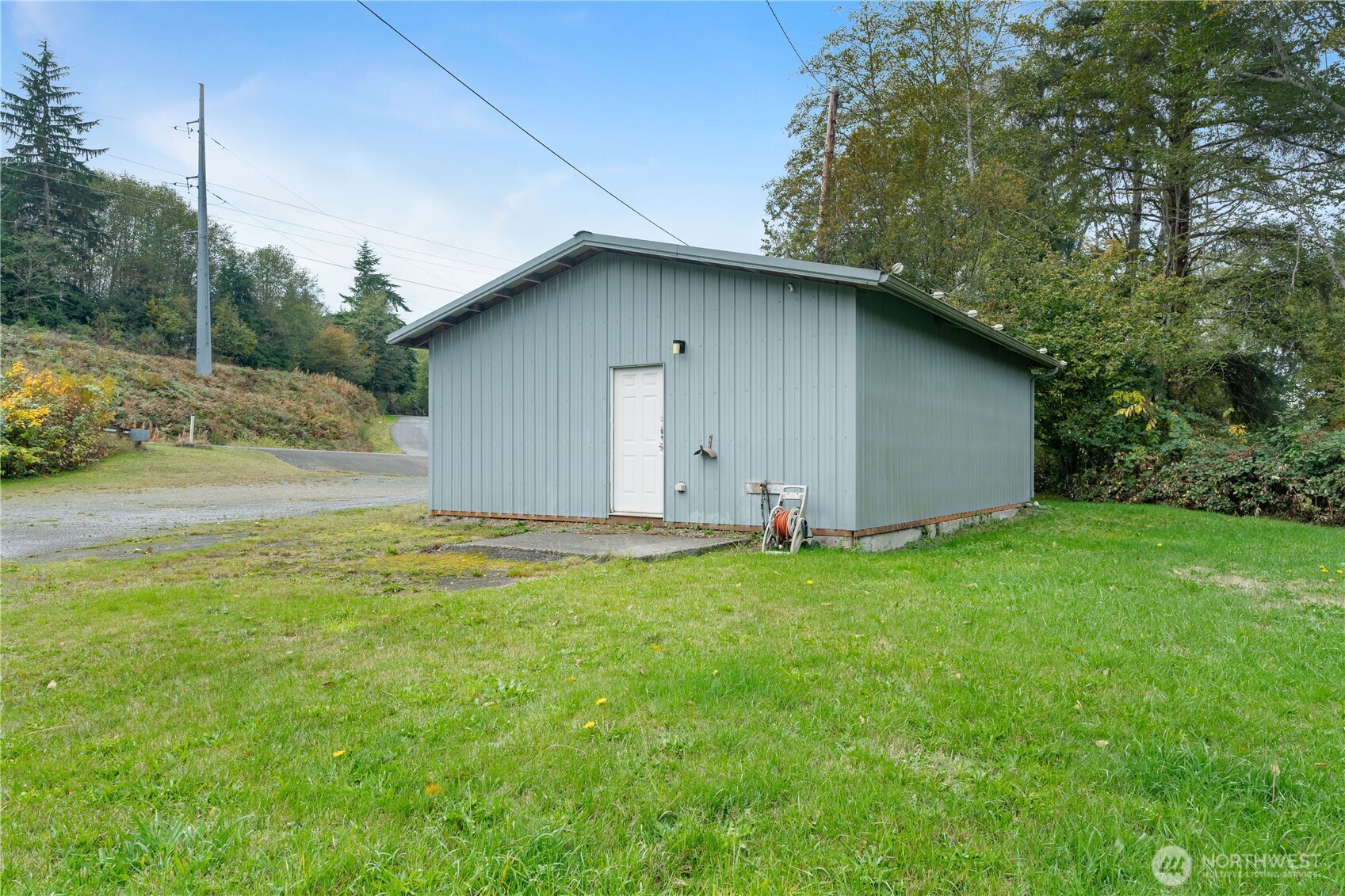 2405 1st Street Cosmopolis, WA 98537 - Photo 23 of 36 a backyard of a house with lots of green space