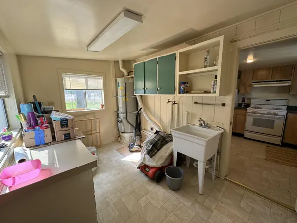 a view of a livingroom and a livingroom with furniture
