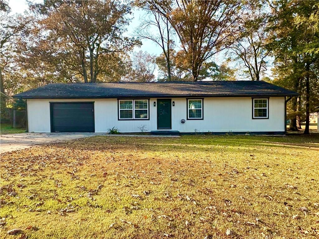 a house with a tree in front of it