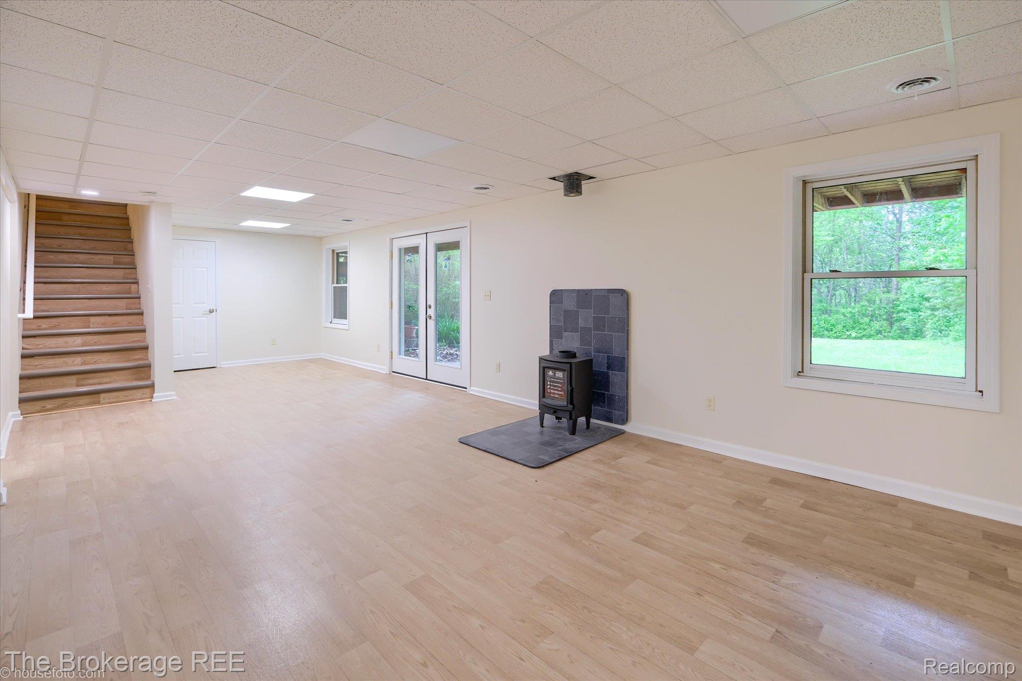 1077 Hadley Road Lapeer, MI 48446 - Photo 36 of 61 Spacious finished room with wood-finish flooring, drop ceiling, and recessed lighting
