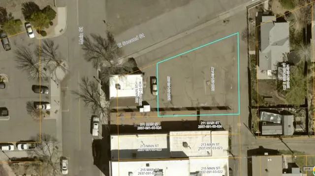 a view of a city with an ocean