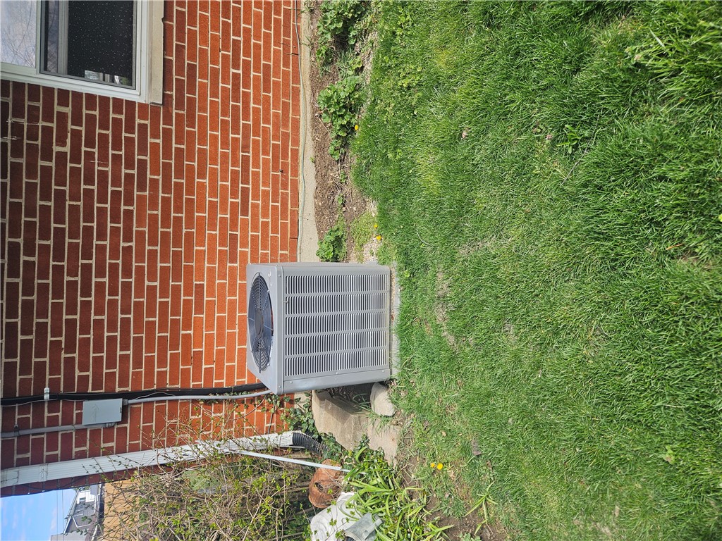 6510 Longford Road Dayton, OH 45424 - Photo 10 of 27 This residence features a sturdy brick exterior and a well-maintained lawn.