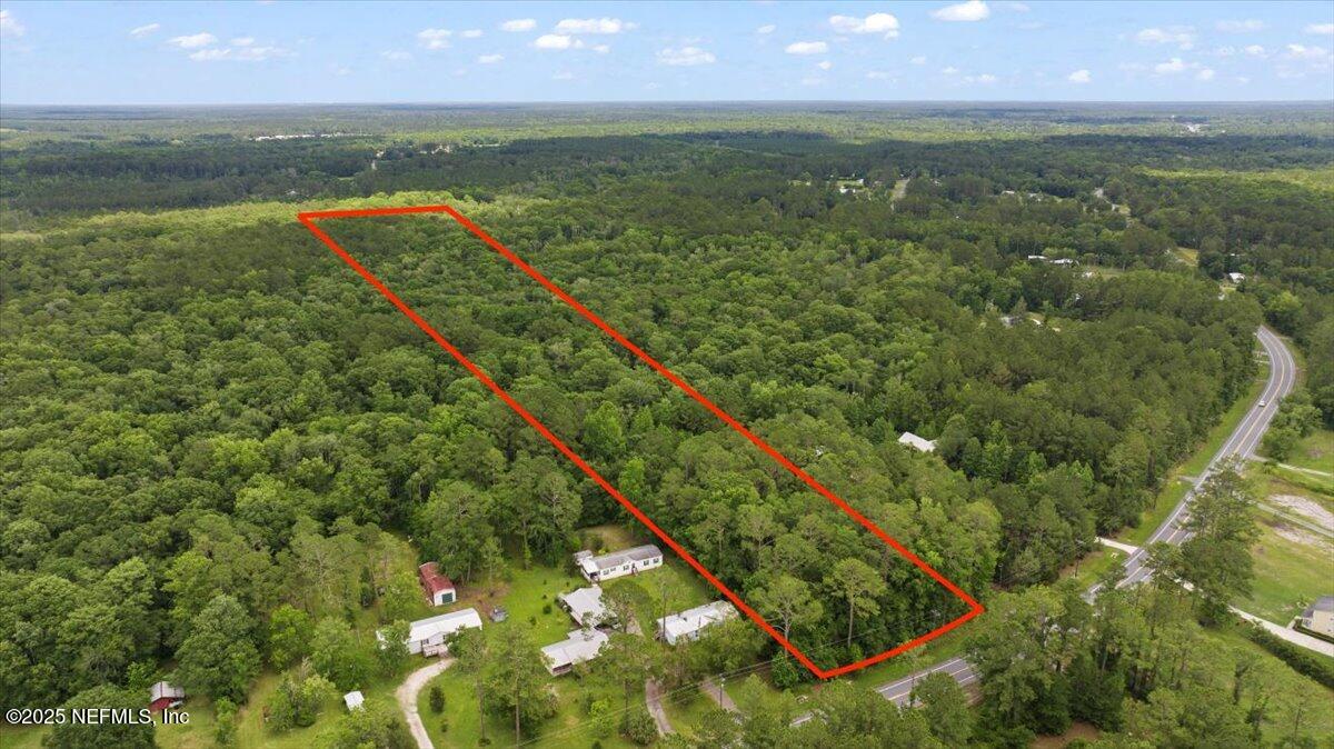451064 Old Dixie Highway Callahan, FL 32011 - Photo 2 of 7 a view of swimming pool from a balcony