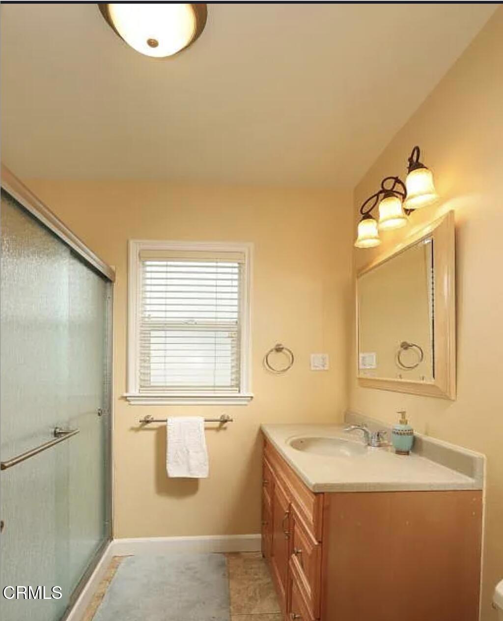 3226 La Crescenta Avenue Glendale, CA 91208 - Photo 18 of 18 a bathroom with a granite countertop sink mirror and a bathtub