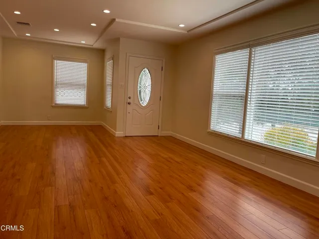 an empty room with windows