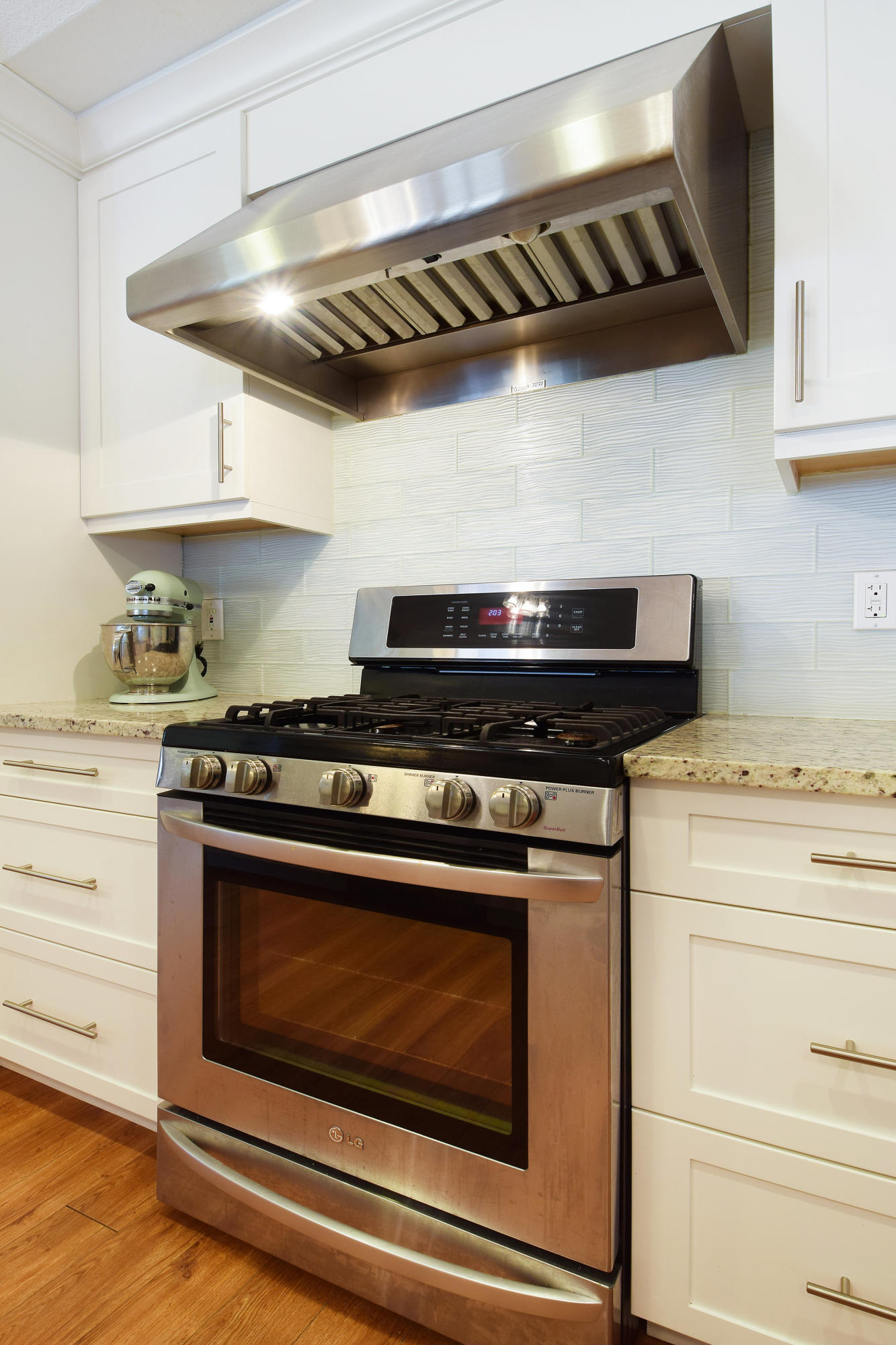 4546 Southeast Azimuth Way Stuart, FL 34997 - Photo 8 of 39 Gas Range with Vented Range Hood