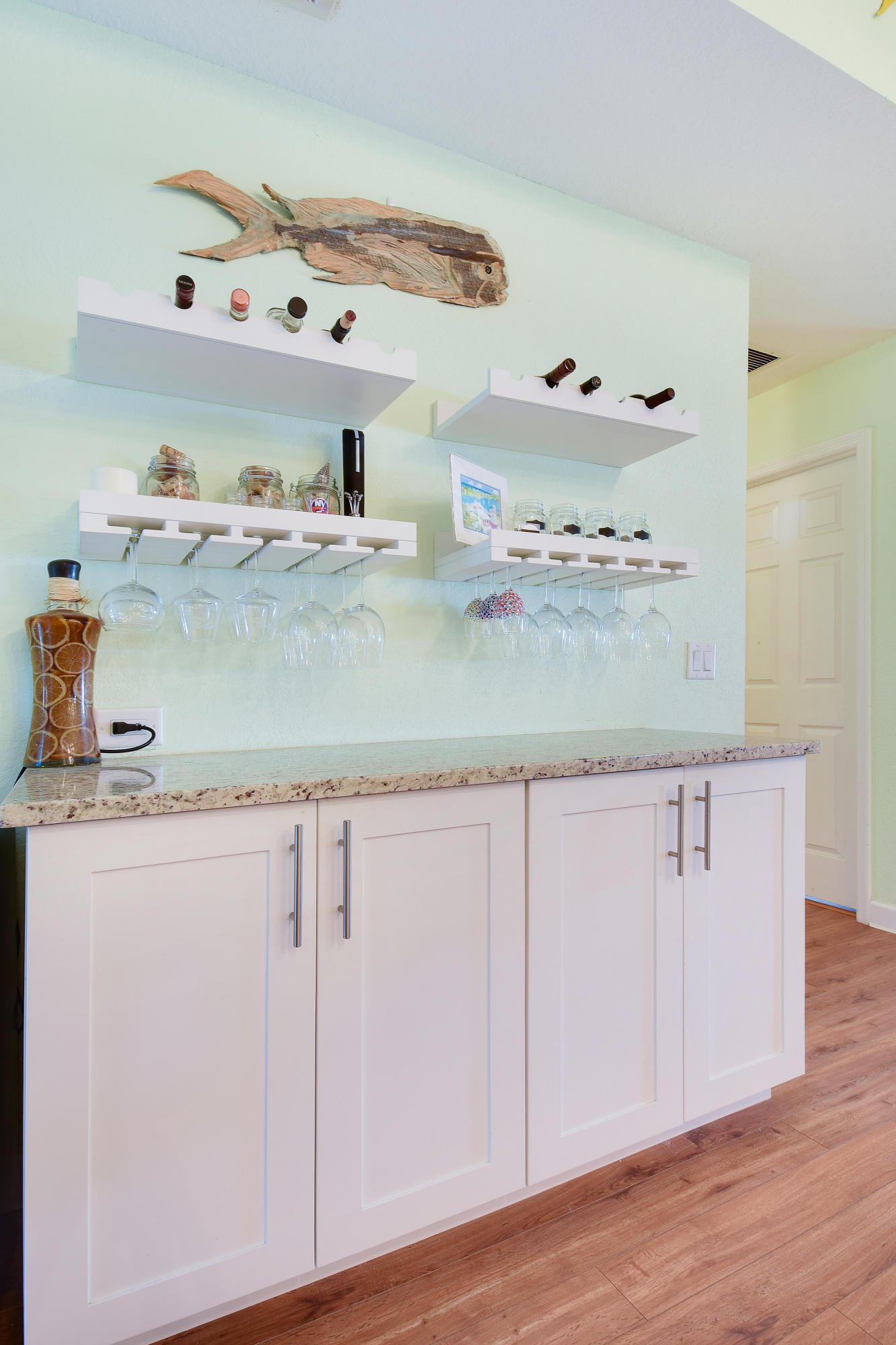 4546 Southeast Azimuth Way Stuart, FL 34997 - Photo 10 of 39 Dry Bar with Wine Racks