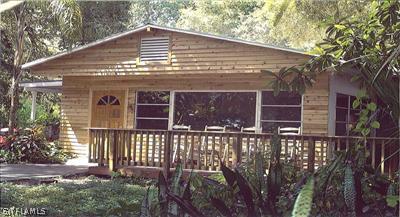 22191 Tuckahoe Road Alva, FL 33920 - Photo 1 of 5 a front view of a house with a porch