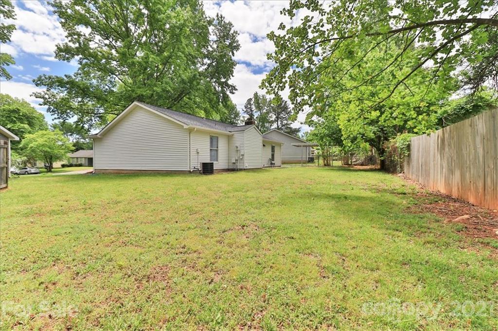 6636 Piney Path Road Charlotte, NC 28212 - Photo 23 of 24 a view of a house with a yard