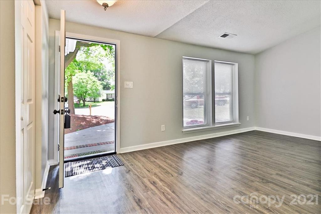 6636 Piney Path Road Charlotte, NC 28212 - Photo 5 of 24 a view of entryway with wooden floor