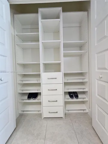 a workspace with furniture and a window