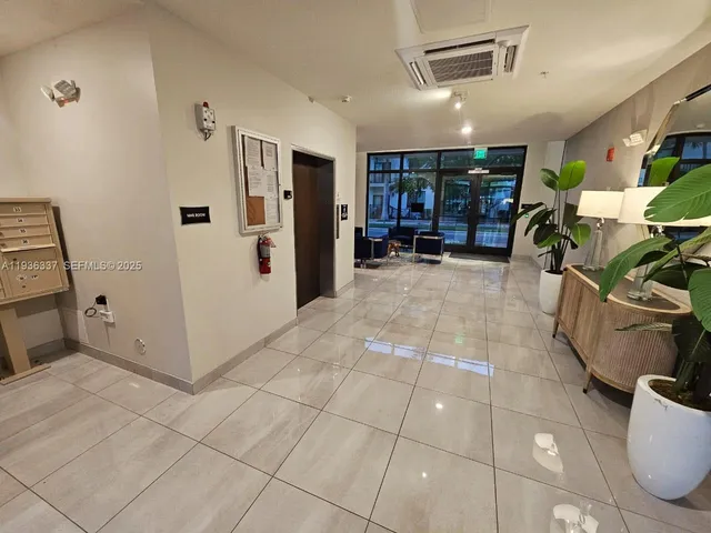 a view of a yard and front view of a building