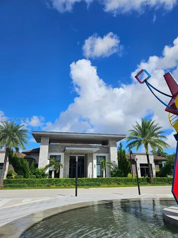 a view of swimming pool with a table and chairs