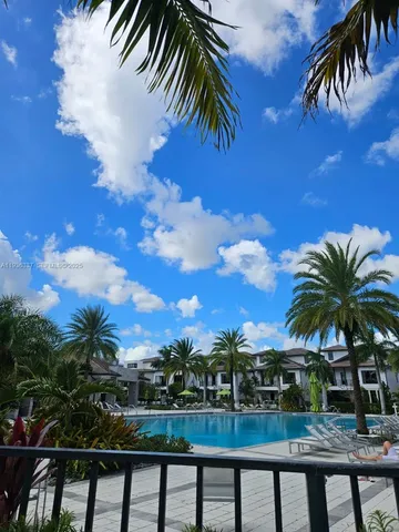 a kitchen with stainless steel appliances a refrigerator and a counter top