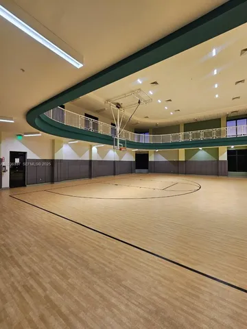 a room with furniture and flat screen tv