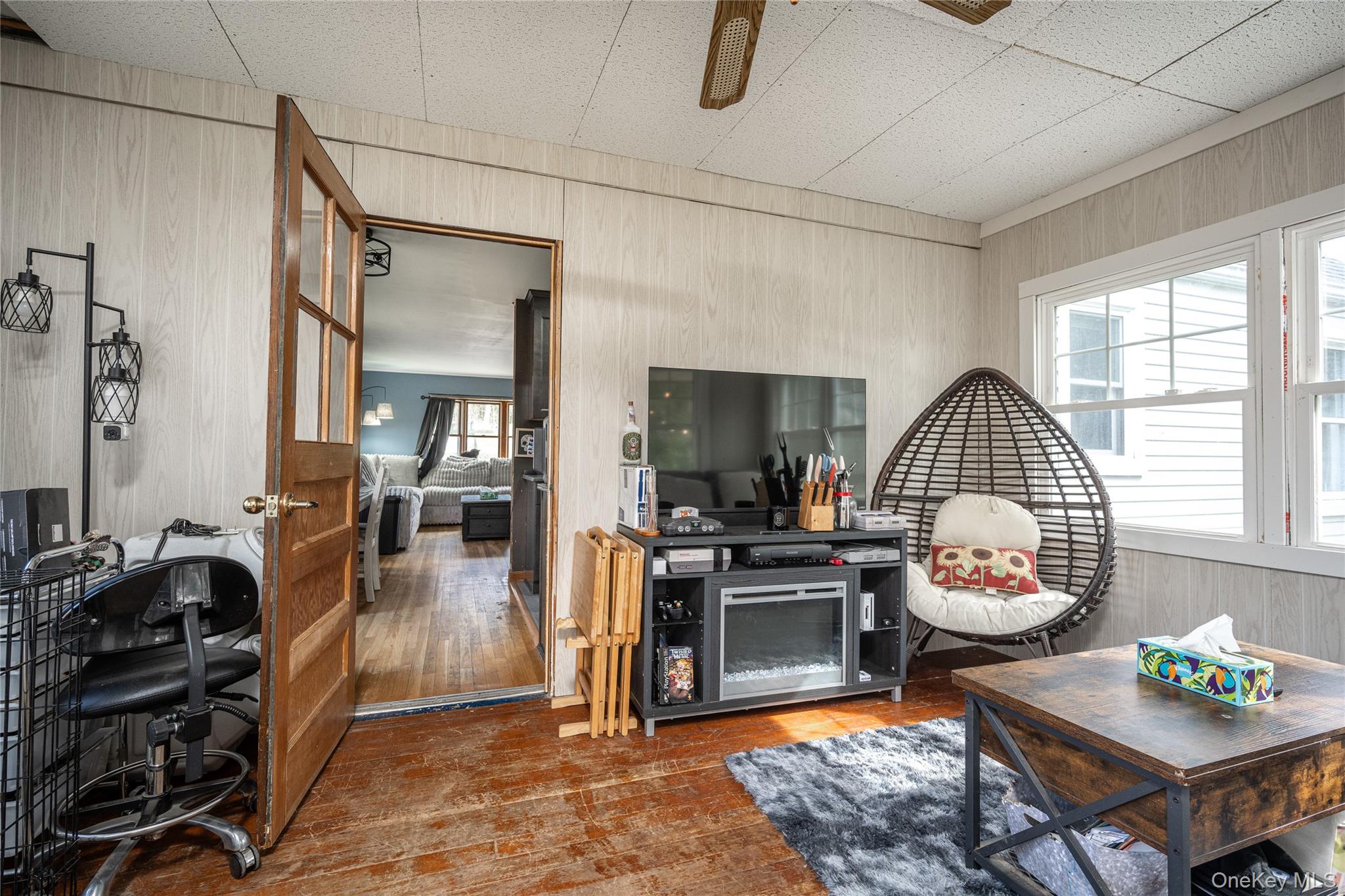 36 Edgewood Road Cortlandt Manor, NY 10567 - Photo 12 of 22 Versatile enclosed porch with large windows and abundant natural light.