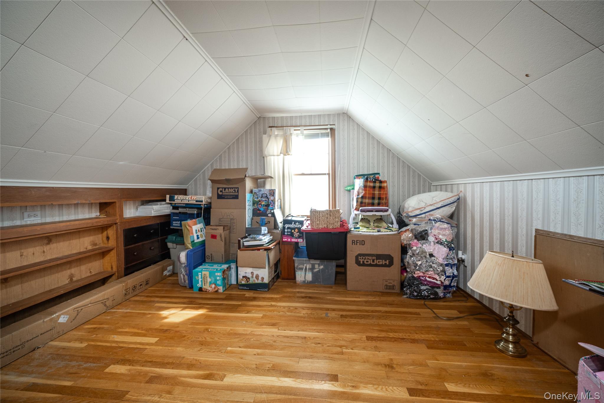 36 Edgewood Road Cortlandt Manor, NY 10567 - Photo 16 of 22 Finished upper-level bedroom offering hardwood floring, built in wall storage and ample living space
