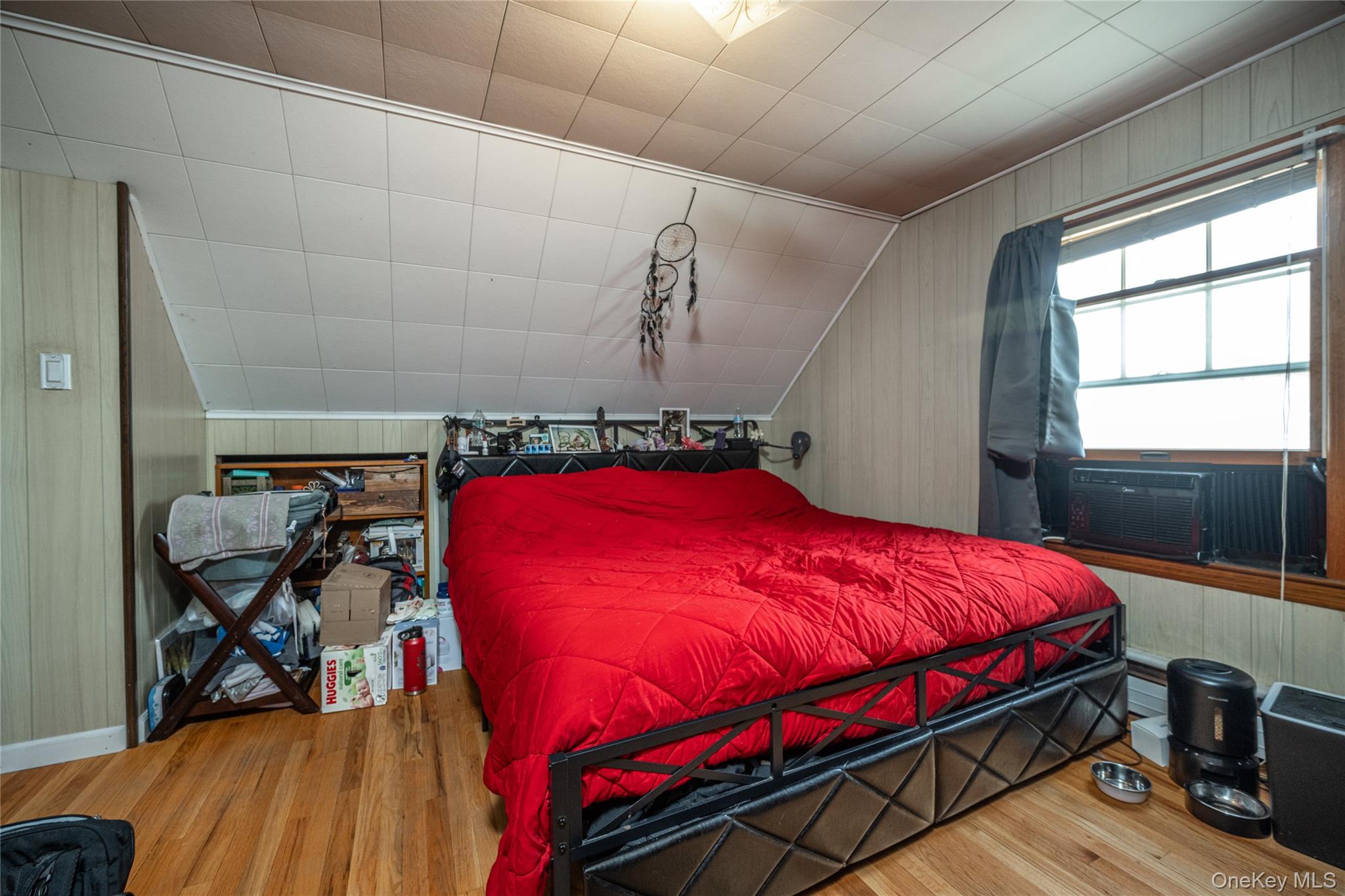 36 Edgewood Road Cortlandt Manor, NY 10567 - Photo 17 of 22 Spacious upper-level bedroom with hardwood floors and functional layout