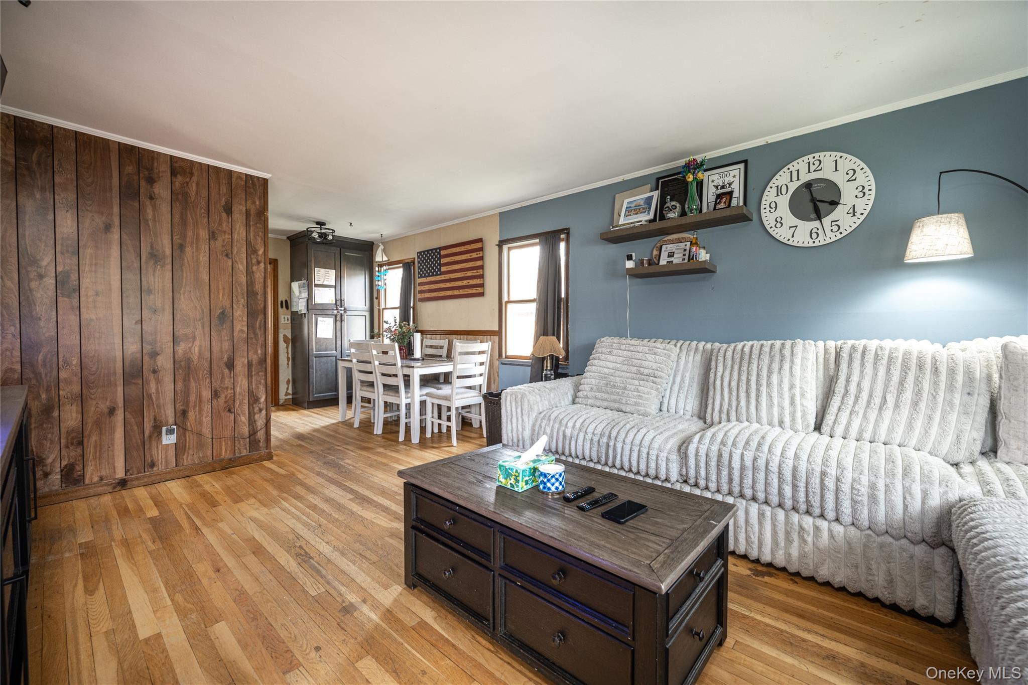 36 Edgewood Road Cortlandt Manor, NY 10567 - Photo 3 of 22 Inviting living room with hardwood floors, large windows, and abundant natural light.