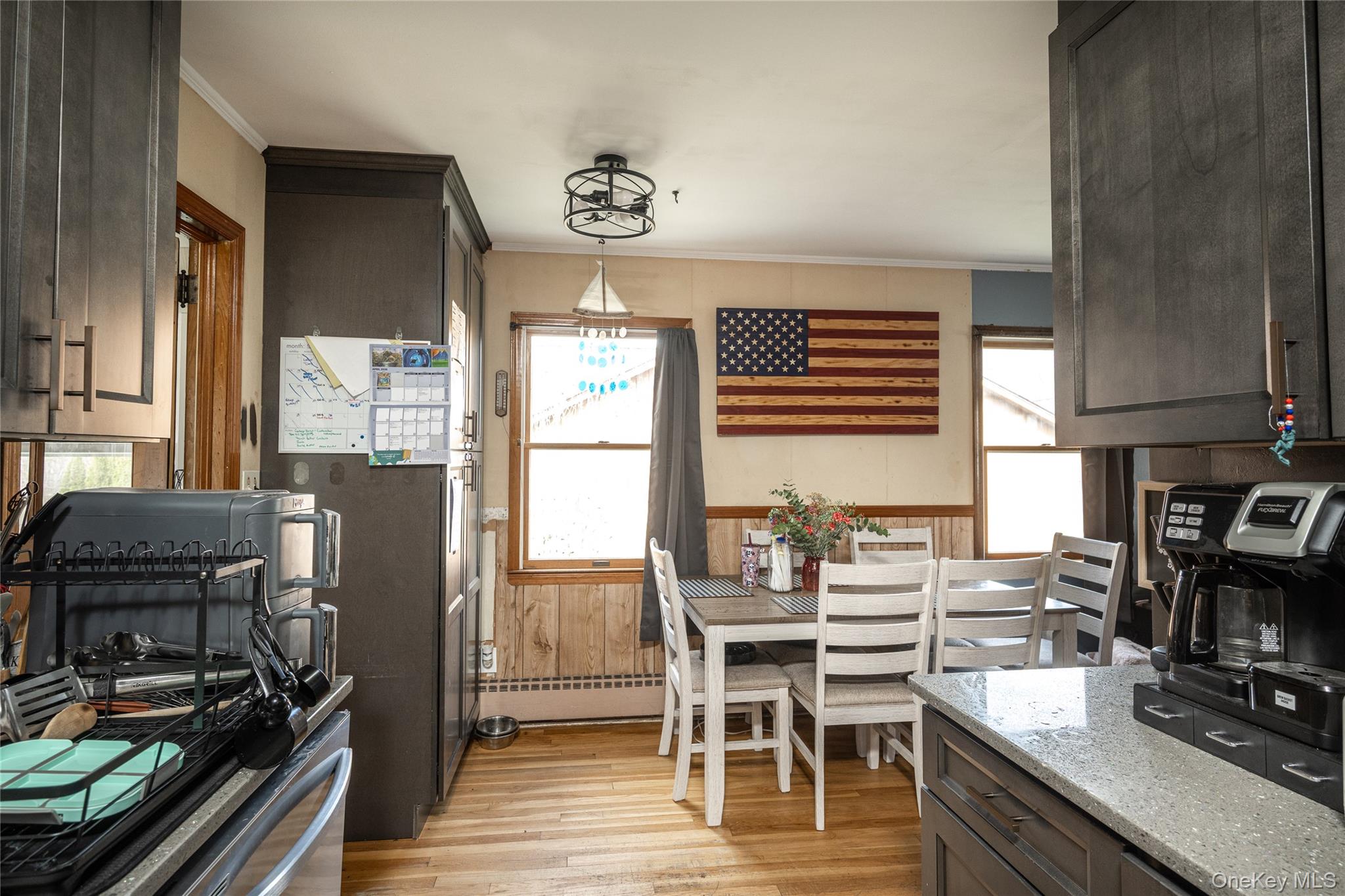 36 Edgewood Road Cortlandt Manor, NY 10567 - Photo 10 of 22 Kitchen opens to dining area, creating a practical and connected layout.